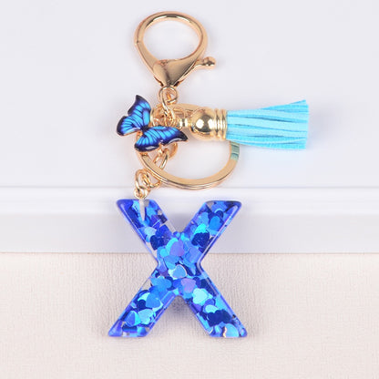Blue Initial Letter Keychain with Butterfly & Tassel V Boutique Studio
