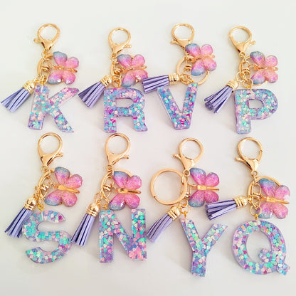 Glitter Resin Letter Keychain – Purple Tassel & Butterfly Charm