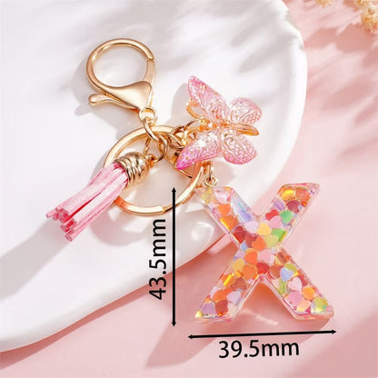 Custom Pink Glitter Initial Keychain with Butterfly & Heart Charm V Boutique Studio