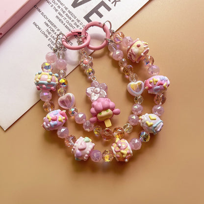 Lanière de téléphone en perles faite à la main avec un personnage mignon