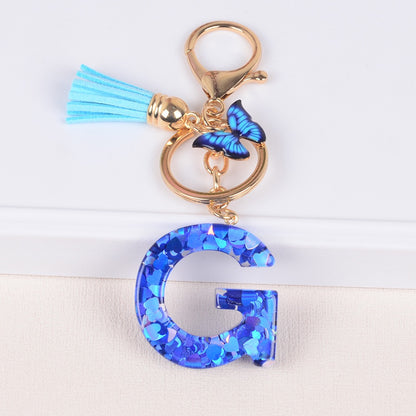 Blue Initial Letter Keychain with Butterfly & Tassel V Boutique Studio