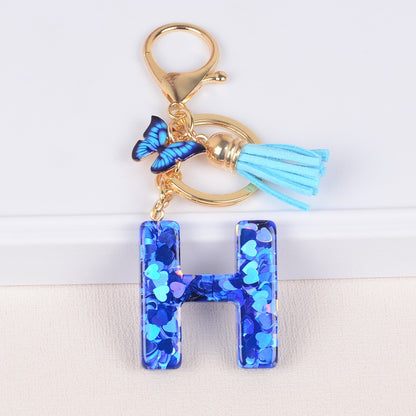 Blue Initial Letter Keychain with Butterfly & Tassel V Boutique Studio