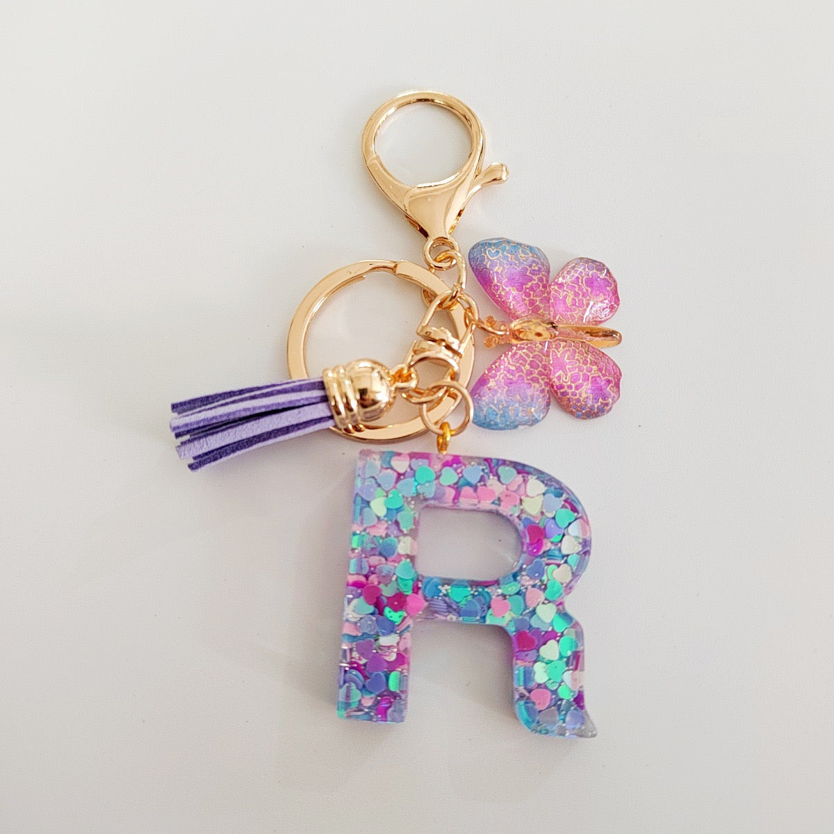 Glitter Resin Letter Keychain – Purple Tassel & Butterfly Charm