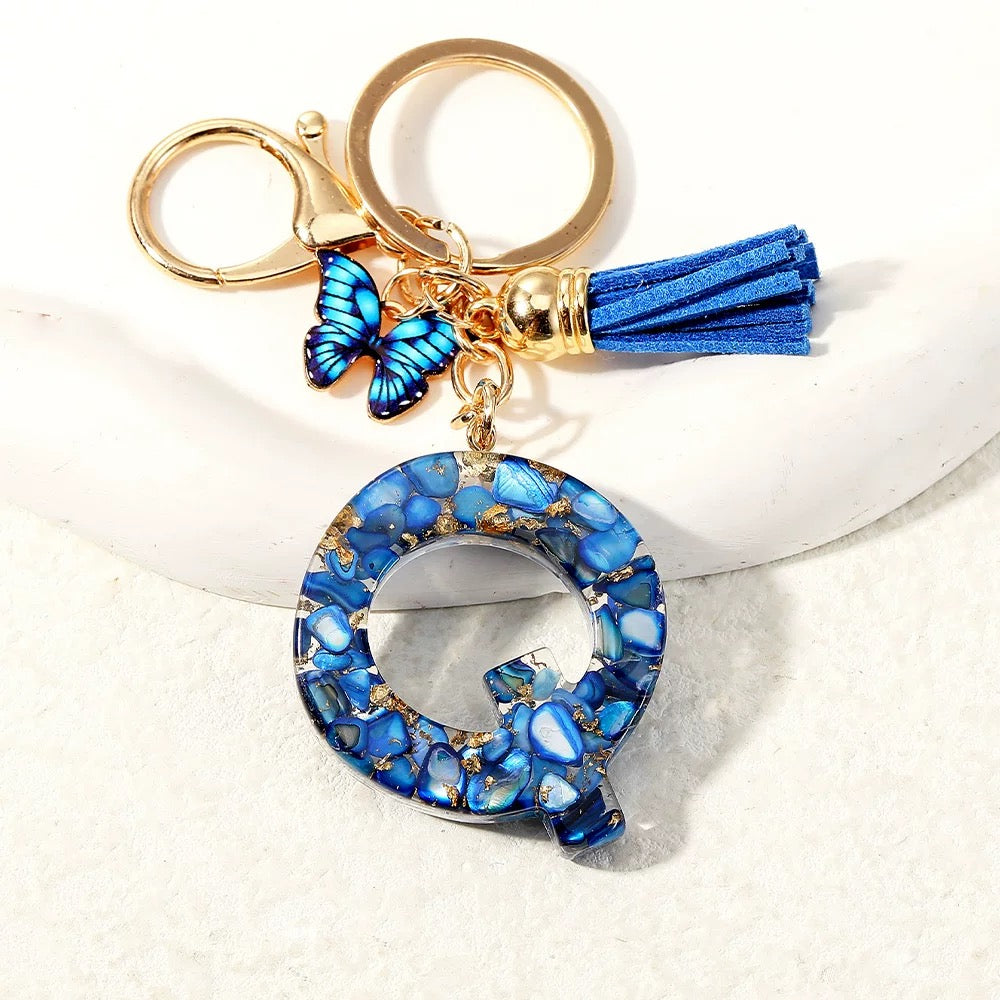 Blue Glitter Resin Initial Keychain – Butterfly & Tassel Charm