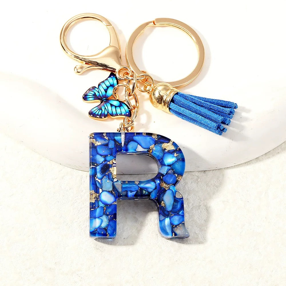 Blue Glitter Resin Initial Keychain – Butterfly & Tassel Charm