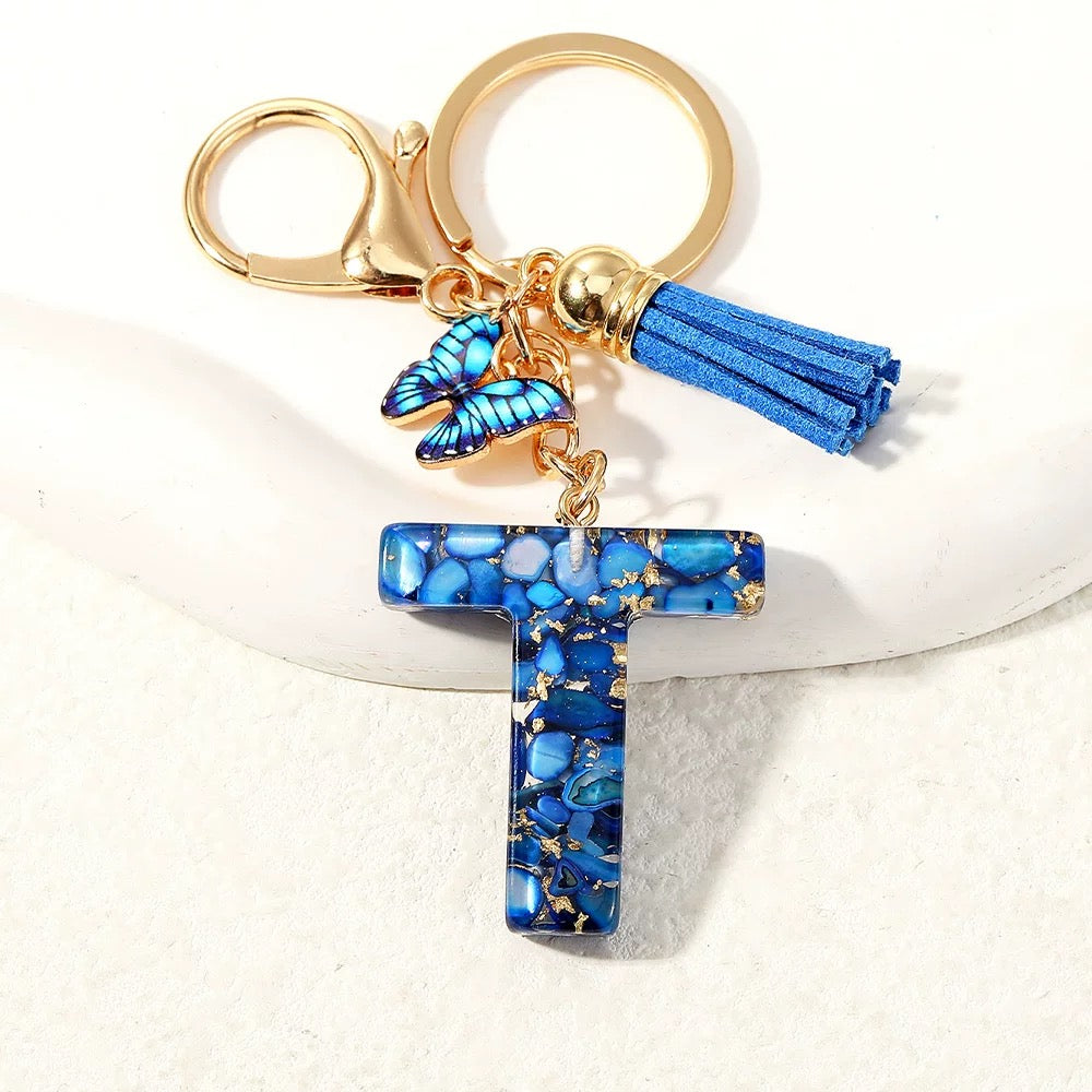 Blue Glitter Resin Initial Keychain – Butterfly & Tassel Charm