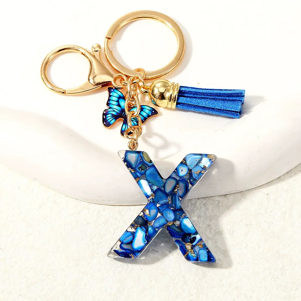Blue Glitter Resin Initial Keychain – Butterfly & Tassel Charm