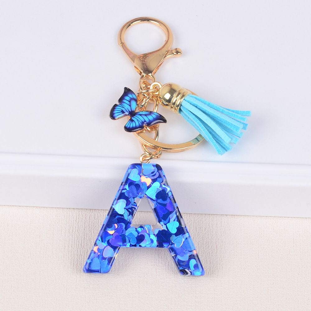 Blue Initial Letter Keychain with Butterfly & Tassel V Boutique Studio